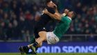 New Zealand’s TJ Perenara hits Ireland fullback  Rob Kearney high at the Aviva Stadium in November. Photograph: James Crombie/Inpho