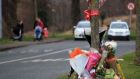 Flowers at the scene in Lucan, Co Dublin, where Neil Reilly was attacked and died. Photograph: Collins