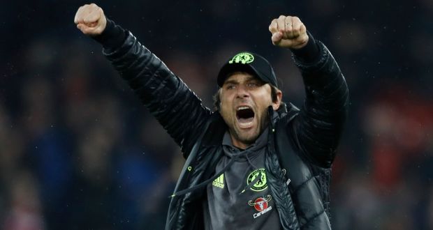 Chelsea manager Antonio Conte celebrates after his side drew 1-1 with Liverpool at Anfield to go nine points clear at the top of the Premier League. Photo: Carl Recine/Reuters