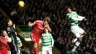 Celtic’s Dedryck Boyata heads home a goal in the  Scottish Premiership match against Aberdeen at Celtic Park. Photograph:  Ian Rutherford/PA Wire