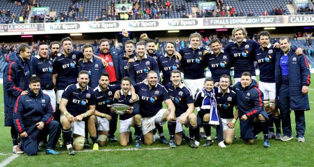 The Scotland team celebrate with the Quaich trophy. Photograph: Dan Sheridan/Inpho