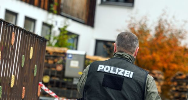 Police moved in on members of a far-right group engaged in forging documents. Photograph: AFP/Getty Images 