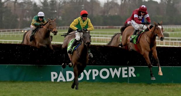 Sizing John and Robbie Power clear the last on the way to winning the  Stan James Irish Gold Cup at Leopardstown. Photograph: Donall Farmer/Inpho