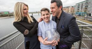 Luke Culhane, who was named Limerick Person of the Year, with his parents Claire and Dermot. Photograph: Seán Curtin/True Media.