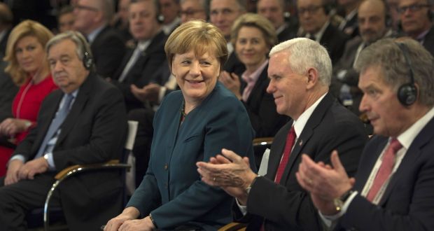  German chancellor Angela Merkel and  Mike Pence at the Munich conference, where the US vice president  pledged “unwavering” support for Nato. Photograph: Guido Bergmann /Bundesregierung via Getty Images