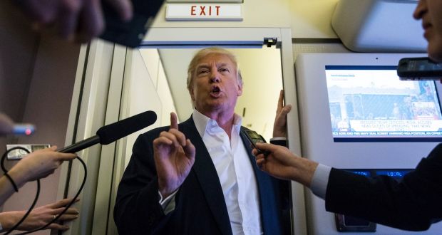 When will he exit? US president Donald Trump speaks with reporters in the press cabin of Air Force One before a rally at Orlando Melbourne International Airport, in  Florida on Friday, February 18th, 2017. Photograph: Al Drago/The New York Times