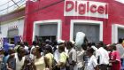 Digicel’s office in Port-au-Prince, Haiti. The company’s restructuring will  involve cutting one in four jobs and  signing a new partnership with a Chinese group, ZTE. Photograph: Thony Belizaire/AFP/Getty Images 