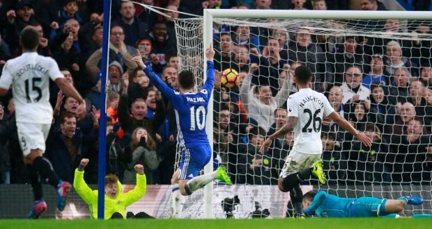 Chelsea’s Eden Hazard celebrates their second goal, scored by Pedro, as Swansea City’s Lukasz Fabianski looks on. Photo: Peter Nicholls/Reuters