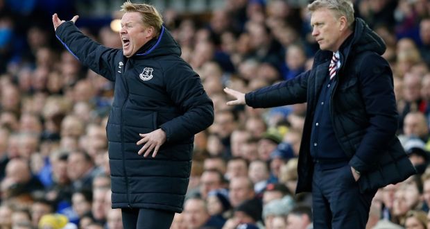 Sunderland manager David Moyes and Everton manager Ronald Koeman give instructions to their players. Photograph: Reuters