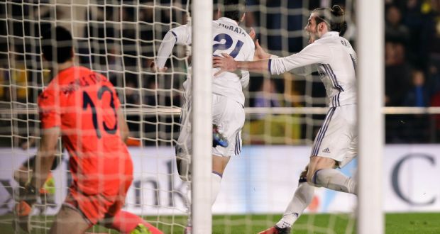 Real Madrid’s Alvaro Morata celebrates with Gareth Bale at El Madrigal stadium. Photograph: Getty Images