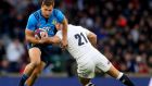 Italy’s Tommaso Benvenuti is tackled by England’s Ben Youngs. Photograph: James Crombie/Inpho