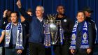 Leicester City vice-chairman Aiyawatt Srivaddhanaprabha, manager Claudio Ranieri, captain Wes Morgan and chairman Vichai Srivaddhanaprabha with the Premier League trophy. Photo: Nick Potts/PA Wire