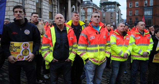 Members of Dublin Fire Brigade at a rally outside Dublin City Hall campaigning to keep Dublin Fire Brigade’s ambulance service. Photograph: Aidan Crawley
