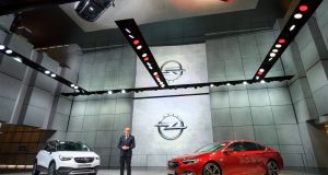 Opel chief executive Karl-Thomas Neumann at the presentation of the new Opel Crossland X (left) and Opel Insignia Grand Sport cars at the 87th Geneva International Motor Show. Photograph: Martial Trezzini