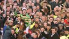 Istabraq and Charlie Swan are led back after winning their third  Champion Hurdle in a row in 2000. Photograph: Healy Racing
