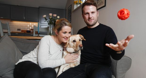  K9 Connectables founders Lauren and James McIlvenna from Howth, with Sandy the Labrador. Photograph:  Conor McCabe Photography