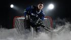 Lee Chin swapped his boots for a pair of ice skates to join NHL team the Vancouver Canucks for a week. Photograph: Inpho