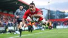 Munster’s Francis Saili scores his second try against Ospreys in the Guinness PRO12 at Musgrave Park. Taken on Canon EOS-1D X, 100th sec @ f2.8. Photo: James Crombie/Inpho