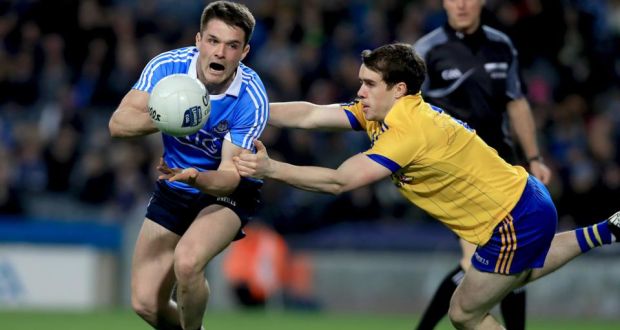 Dublin’s Eric Lowndes is tackled by  David Murray of Roscommon during the Allianz League Division One game at Croke Park. Photograph: Donall Farmer/Inpho