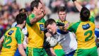 Monaghan’s Conor McManus is surrounded by Donegal players during the  Allianz Football League Division One game at  Fr Tierney Park in  Ballyshannon. Photograph: Trevor Lucy/Inpho/Presseye