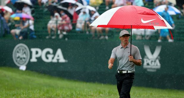 Rory McIlroy walks up the 16th hole in heavy rain during the second round of the 2014 USPGA Championship at Valhalla Golf Club in Louisville, Kentucky. Photo: Mike Ehrmann/PGA of America via Getty Images