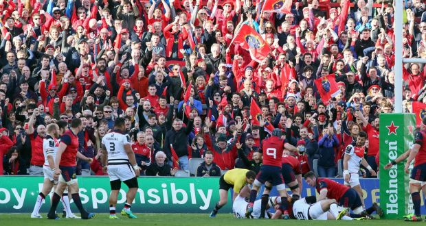 Munster fans celebrate their team’s first try against Toulouse at Thomond Park. Photograph: Getty Images