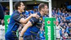 Joey Carbery celebrates with Fergus McFadden after his try in Leinster’s Champions Cup win over Wasps. Photograph: Morgan Treacy/Inpho