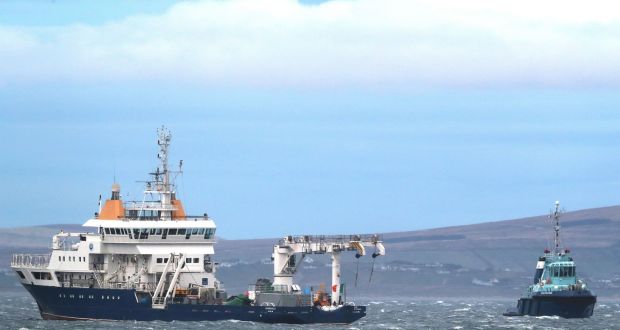 The Granuaile arriving in Blacksod, Co Mayo, with wreckage from Coast Guard helicopter Rescue 116 onboard. Photograph: Brian Lawless/PA Wire 