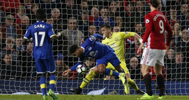 Everton’s Ashley Williams handles the ball in the penalty area, resulting in a late penalty at Old Trafford. Photograph: Inpho