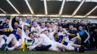 The Tipperary players celebrate after their win over Louth in the Division 3 final. Photograph: Tommy Dickson/Inpho
