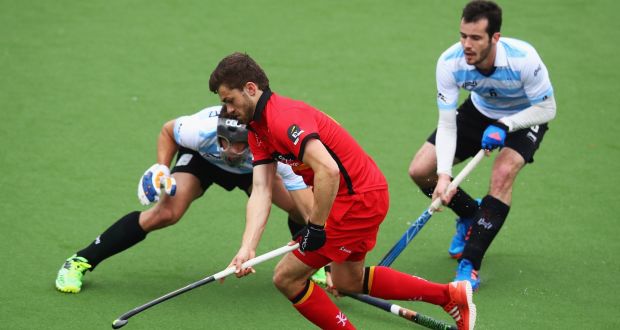 Banbridge’s  Matthew Bell in action against  Christophe Peters-Deutz and Jean-Laurent Kieffer of Racing Club de France   at HC Oranje-Rood.  Photograph:  Dean Mouhtaropoulos/Getty Images