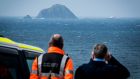 Coast Guard personnel view the R116 recovery operation at Blackrock Island. Photograph: Keith Heneghan/Phocus