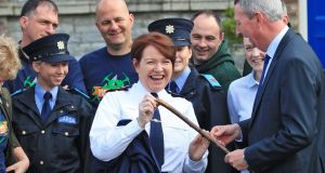 Garda Commissioner Nóirín O’Sullivan is presented with a shillelagh walking stick at Garda Headquarters by Chief Supt Pat Lordan. Photograph: Colin Keegan/Collins Dublin