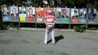 Decisions, decisions: A man looks at campaign posters of the 11th candidates running in the 2017 French presidential election, in Saint Andre de La Roche, near Nice, France. Photograph: Reuters/Eric Gaillard
