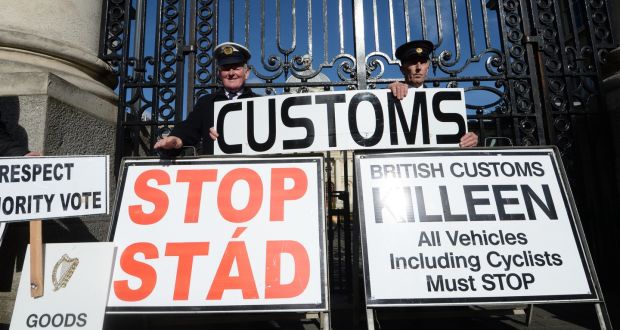 Séamus McDonnell, a farmer from Clontigora, south Armagh, and John McNamee, chairman of a cross-Border regeneration group protest outside Government Buildings. Photograph: Cyril Byrne/The Irish Times 