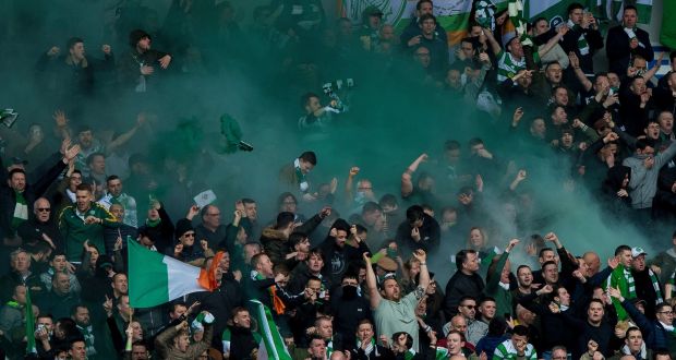 Celtic fans celebrate during their team’s 5-1 win at Ibrox. Photograph: PA