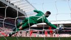 Fraser Forster saves James Milner’s penalty during Southampton’s goalless draw with Liverpool. Photograph: Reuters/Phil Noble