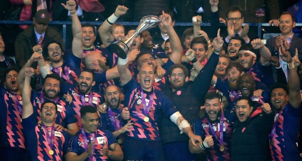 Stade Francais captain Sergio Parisse lifts the Challenge Cup after his side’s win over Gloucester. Photograph: Mike Egerton/PA
