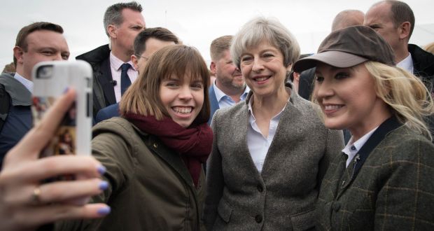 Prime minister Theresa May poses for a selfie at the Balmoral Show near Lisburn in Northern Ireland on Saturday. Photograph:  Stefan Rousseau/PA Wire