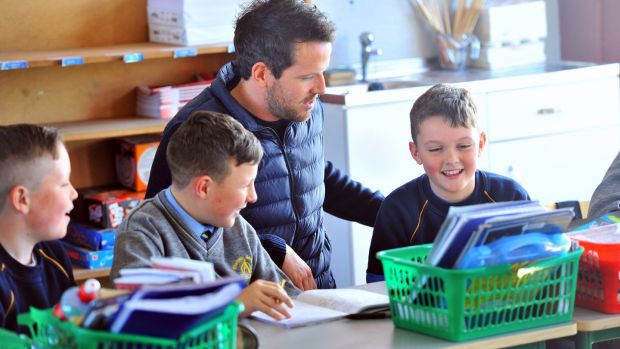 Mark Russell with his students: “My primary concern is that the children are safe and happy when they come to school, and that they feel secure.” Photograph: Daragh McSweeney/Provision