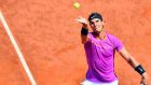  Spain’s Rafael Nadal in action against his compatriot Nicolas Almagro during their second-round match of the Italian Open tennis tournament at the Foro Italico in Rome. Almagro retired from the match due to an injury. Photograph: Ettore Ferrari/EPA