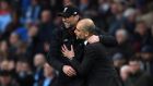 Liverpool manager  Jurgen Klopp and Manchester City manager Pep Guardiola are both looking to secure Champions League qualification this weekend. Photograph: Getty Images