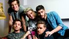  Zayn Malik, Liam Payne, Louis Tomlinson, Niall Horan and Harry Styles from One Direction pose as they attend the book signing of One Direction’s book ‘Where We Are’ in 2013. Photograph: Karwai Tang/WireImage