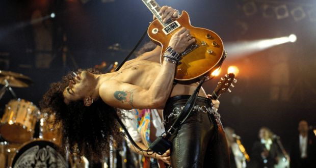 Slash performing  at a tribute concert to Freddie Mercury at Wembley Stadium, London, on April 20th, 1992. Photograph: Mick Hutson/Redferns