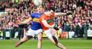 Armagh’s Aidan Forker in action against Tipperary’s Robbie Kiely during the league clash at the Athletic Grounds.   Photograph: Philip Magowan/Presseye/Inpho 