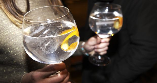 The way gin is served – fishbowl-style glasses with garnishes  – adds to its fashionability. Photograph: Getty Images