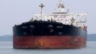 A Panamanian-flagged  oil tanker  anchored 14km south of Singapore. Traders are again hiring oil tankers to store unsold crude while they wait for higher prices. Photograph: Reuters