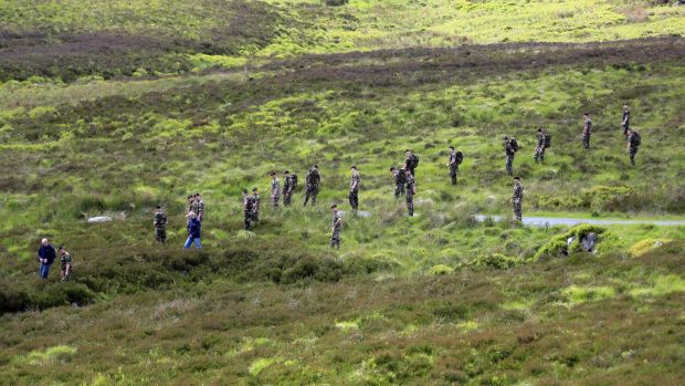 13/06/17 Members of the Defence Forces and Gardai search the the Sally Gap to Lacken Road in the Dublin/Wicklow Mountains where the search is continuing for body parts after a dismembered torso was discovered by walkers last Saturday evening...Picture Colin Keegan, Collins Dublin.
