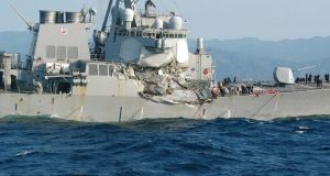A handout photograph made available by the 3rd Regional Coast Guard Headquarters shows the damaged US Navy destroyer USS Fitzgerald after its collision with a container ship. Photograph: EPA