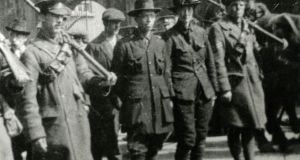 Michael Mallin and Countess Markievicz being escorted away by government troops, Easter rising 1916.  Photograph: Courtesy of National Museum of Ireland